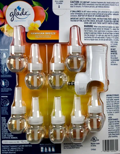 Vista 4 de Glade PlugIns Hawaiian Breeze - Aceite perfumado – 9 repuestos + 1 calentador