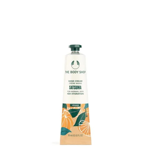 Vista 10 de The Body Shop Crema de manos de karité – Fragancia de nuez, hidratación y protección para llevar – 1.0 oz