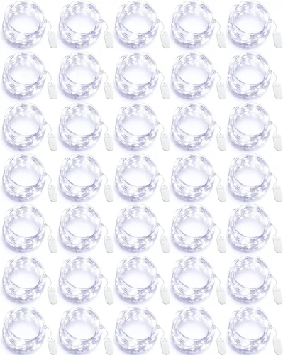 Vista 8 de Riakrum Guirnalda de 20 luces de hadas de 7 pies a pilas [3 estilos], tira de luces LED a granel impermeable para tarros de Navidad, boda Cálido