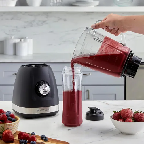Vista 11 de Licuadora West Bend con jarra de mezcla de 48 onzas y taza de viaje de 20 onzas, diseño compacto con control de dial, 700 vatios, negro