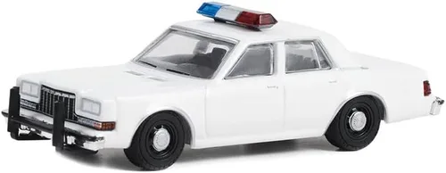 Greenlight 43006-L Hot Pursuit 1980-89 Dodge Diplomat Police Blanco con luz y barras de empuje escala 1/64