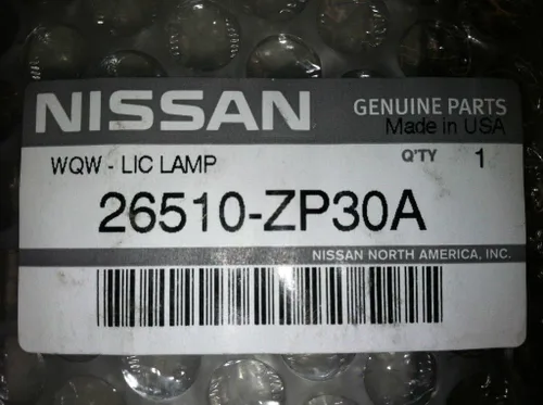 Vista 3 de Nissan Nuevo OEM 2006-2012 Xterra Conjunto de lámpara de matrícula trasera (2 lámparas)